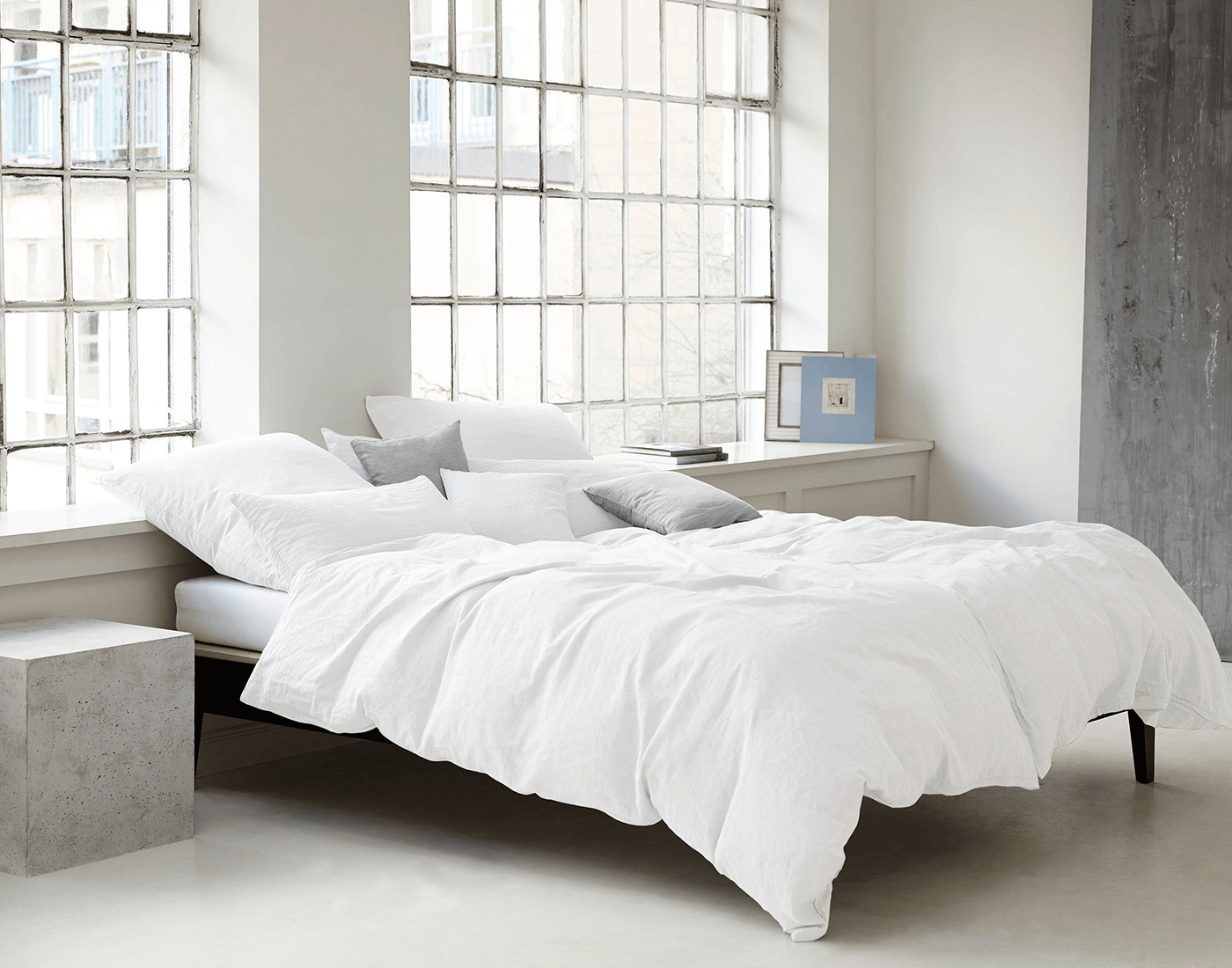 So gelingt ein Wellness-Schlafzimmer - elegante Bettwäsche