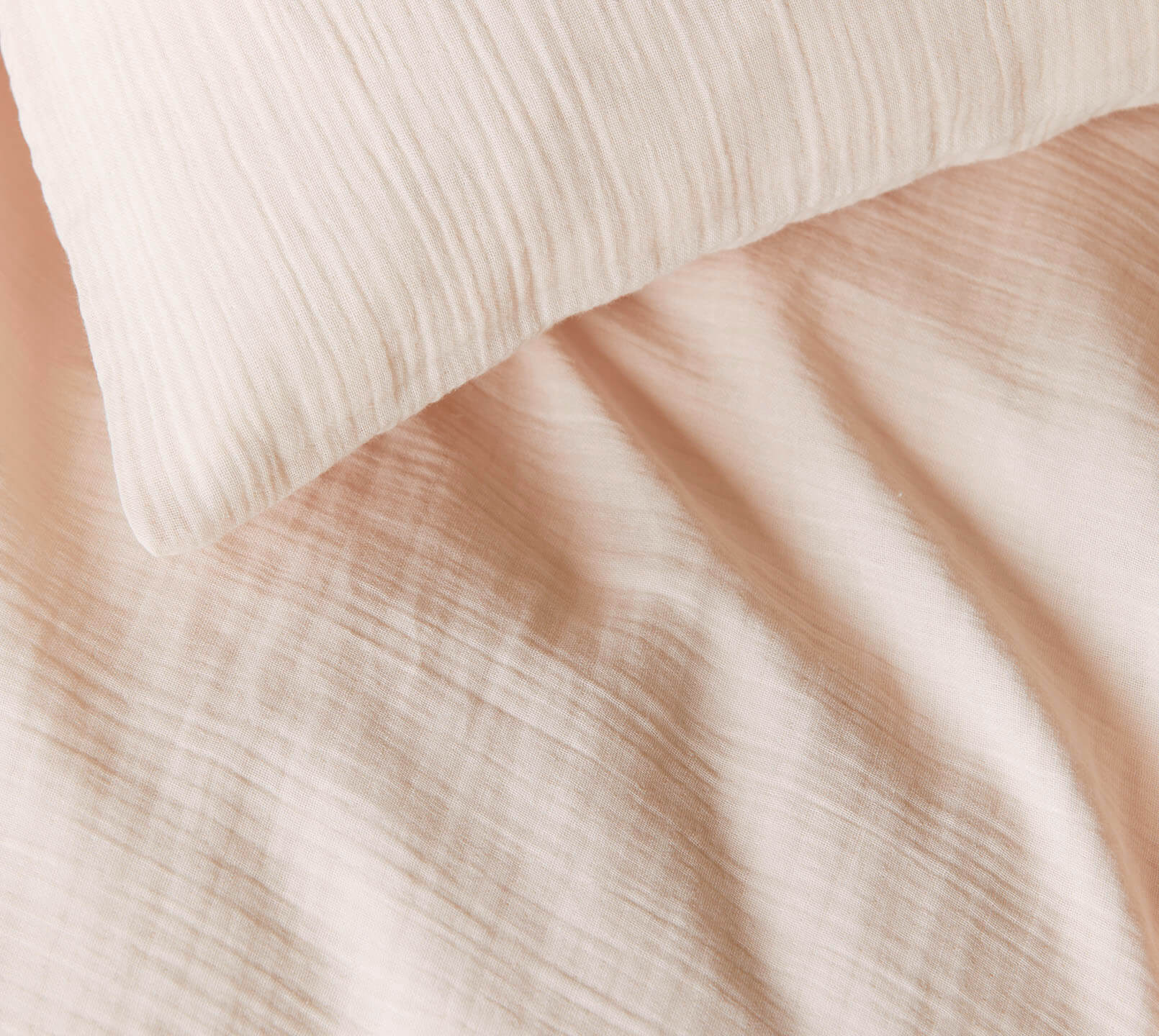 Musselin Bettwäsche Smooth in Peach Uni Detail #farbe_Smooth Peach